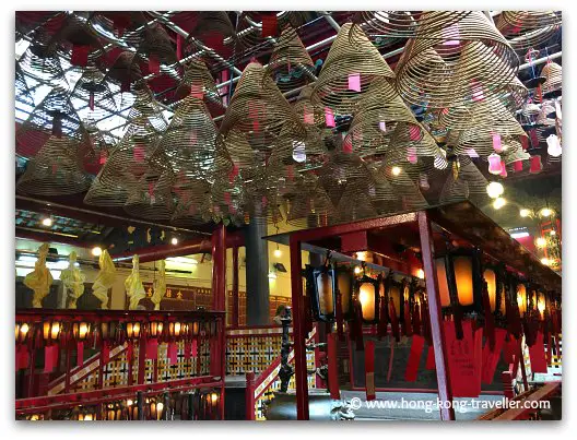 Man Mo Temple Incense Coils hang from roof Man Mo Temple Incense Coils hang from roof