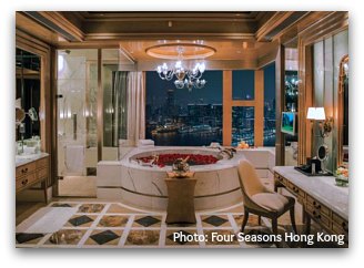 Infinity Pool and views of Kowloon skyline from the Four Seasons Hong Kong Infinity Pool and views of Kowloon skyline from the Four Seasons Hong Kong