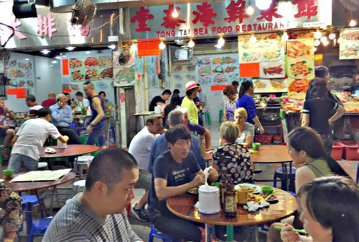 Temple Street Night Market Food Stalls Hong Kong with Picture Menus Temple Street Night Market Food Stalls Hong Kong with Picture Menus on the Walls