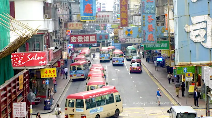 Transportation Options in Hong Kong Busy Hong Kong Street with many Transportation Options: buses, mini buses, etc